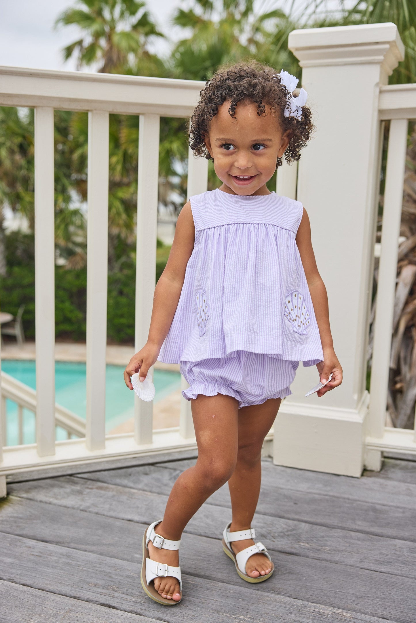 Little English traditional children's clothing. Lavender stripe seersucker diaper set with sea shell applique for baby girls for spring