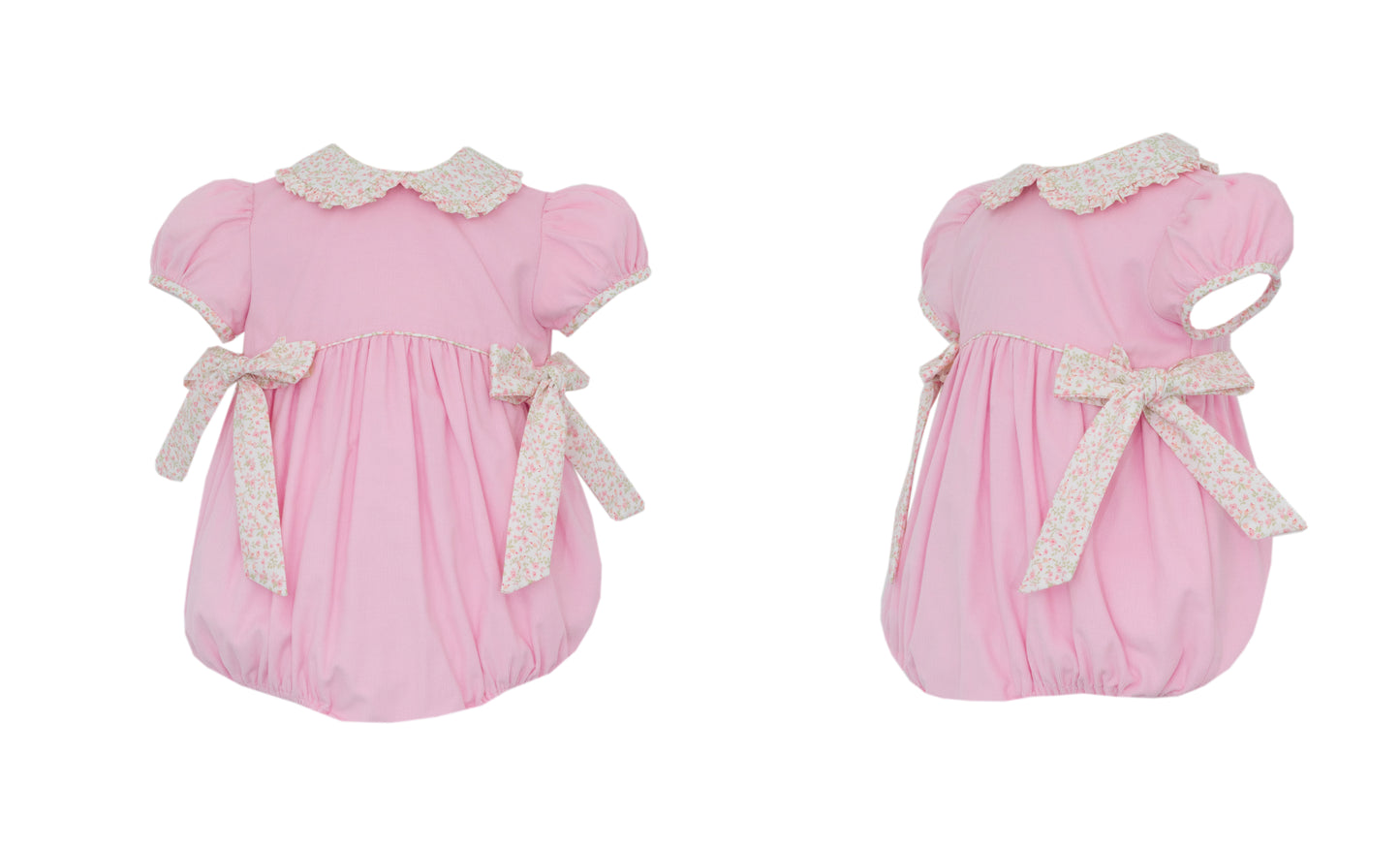 Two pink baby rompers with lace details on a white background
