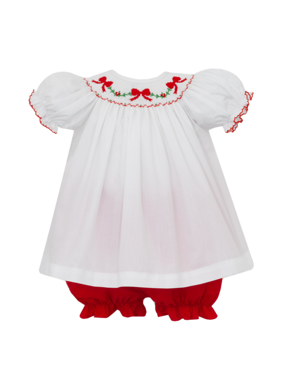 White baby dress with red smocking and ruffled bloomers on a white background