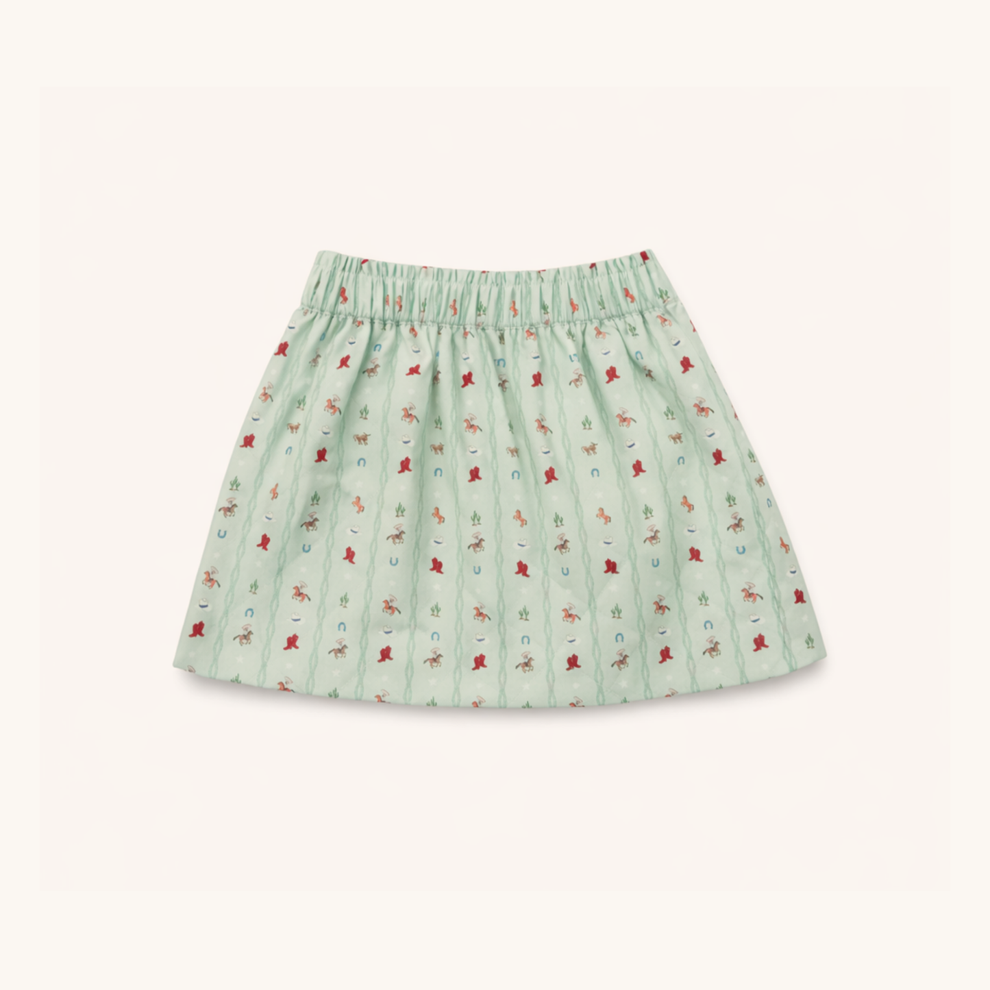 Green skirt with small red pattern on a white background