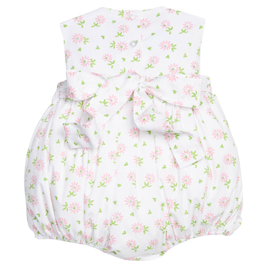 Little English traditional children's clothing. White sleeveless smocked bubble with pink and green florals for baby girls