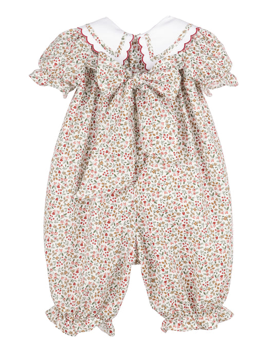 Floral baby romper with ruffled sleeves on a white background