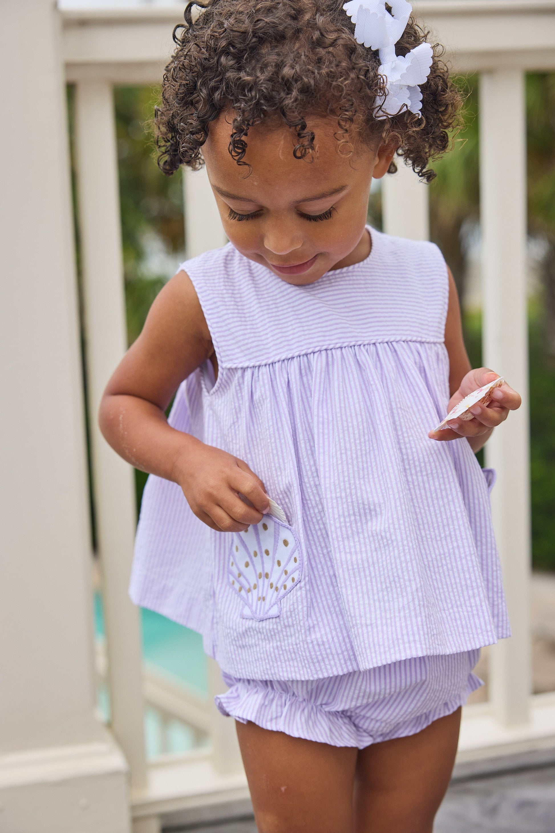 Little English traditional children's clothing. Lavender stripe seersucker diaper set with sea shell applique for baby girls for spring