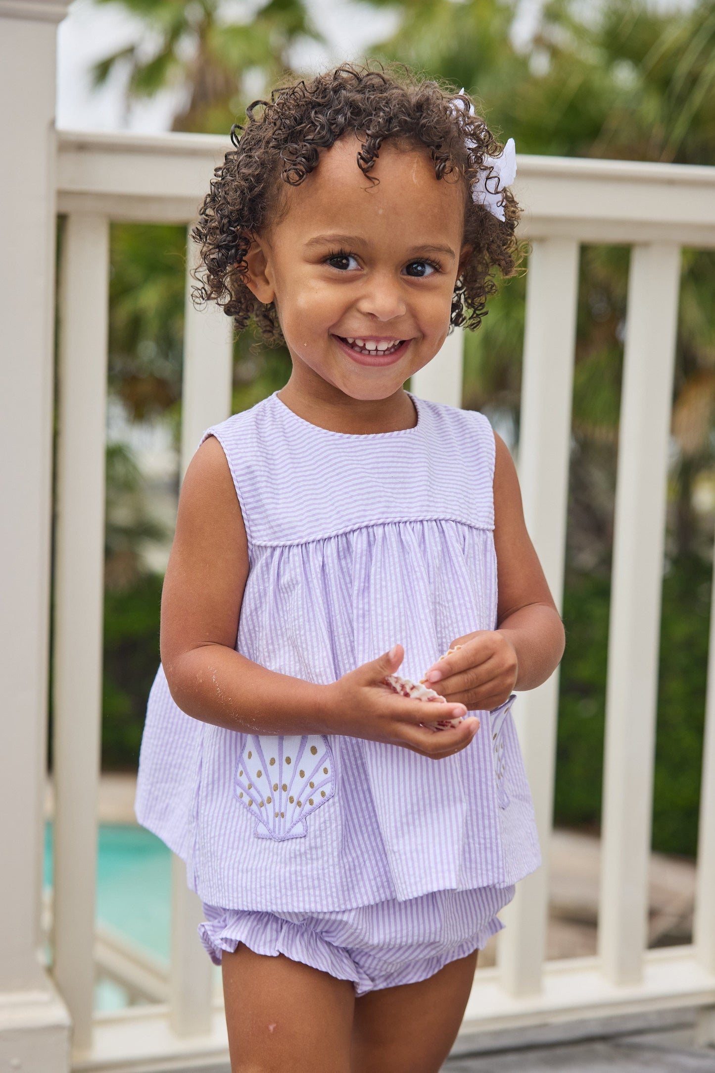 Little English traditional children's clothing. Lavender stripe seersucker diaper set with sea shell applique for baby girls for spring