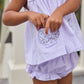 Little English traditional children's clothing. Lavender stripe seersucker diaper set with sea shell applique for baby girls for spring
