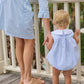 Little English traditional children's clothing.  Light blue seersucker gingham bubble with white bib collar and applique sailboats for baby girls.