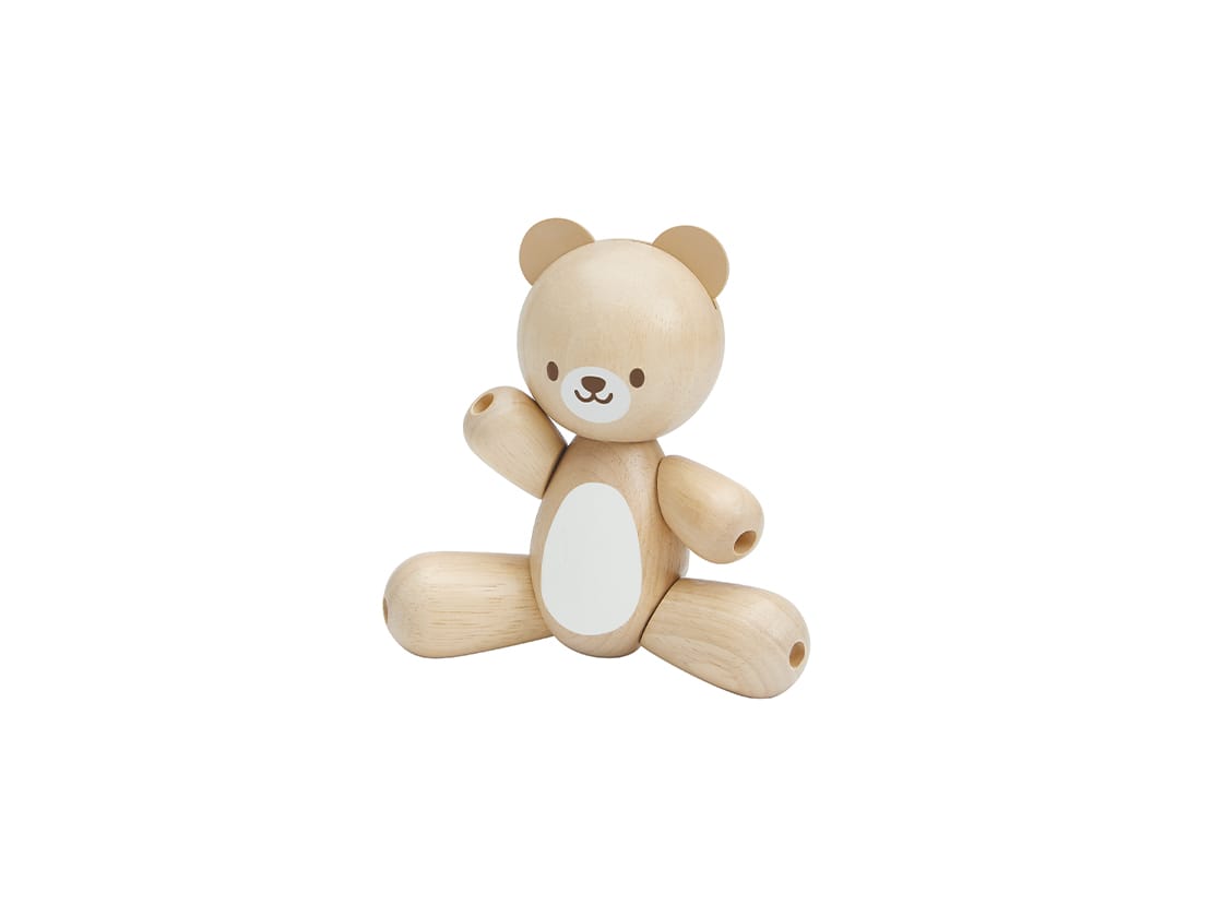 Bear Clutching Toy