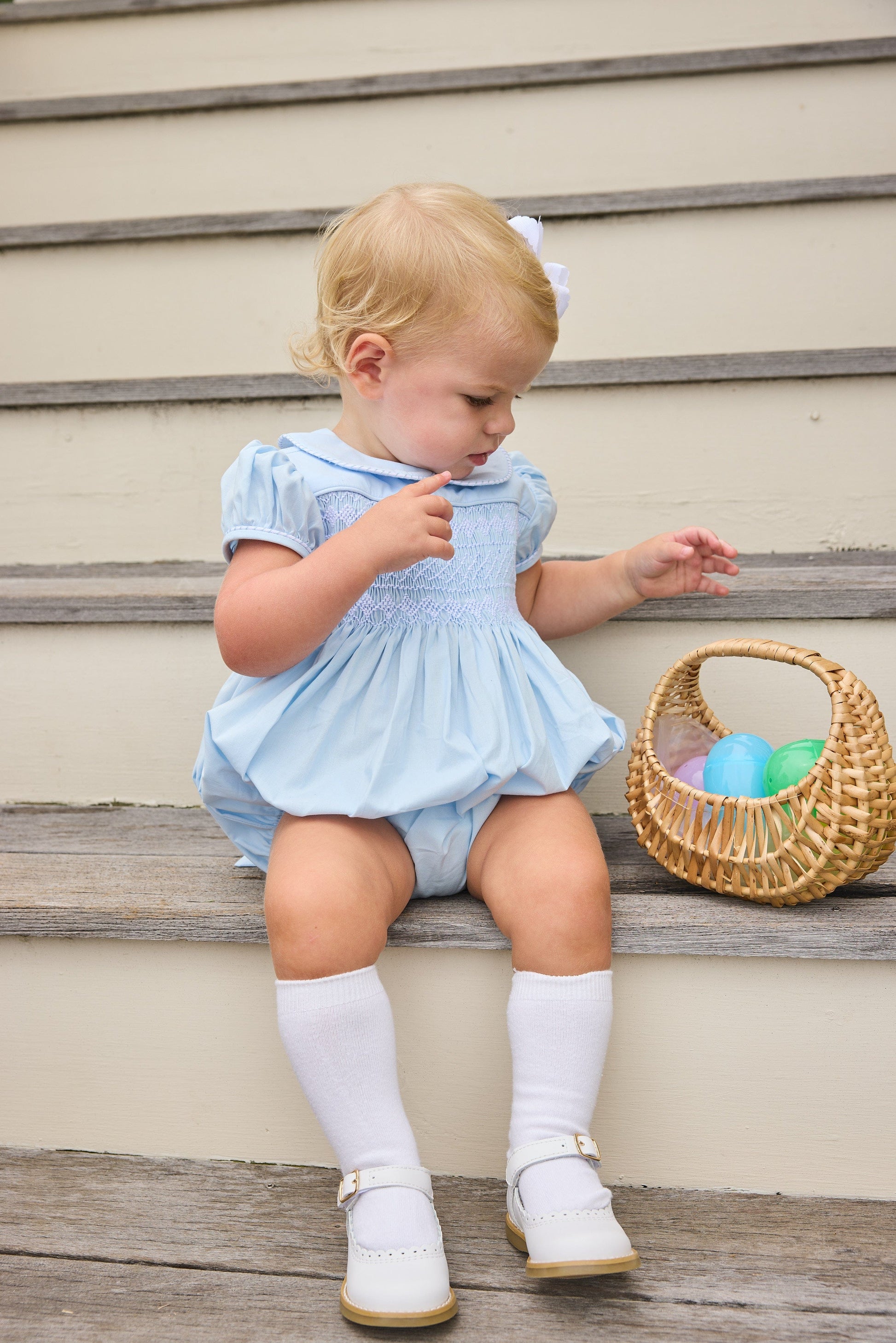 Little English classic smocked emery bubble in light blue with white detailing, smocking around chest, tieable in back, for little girl 