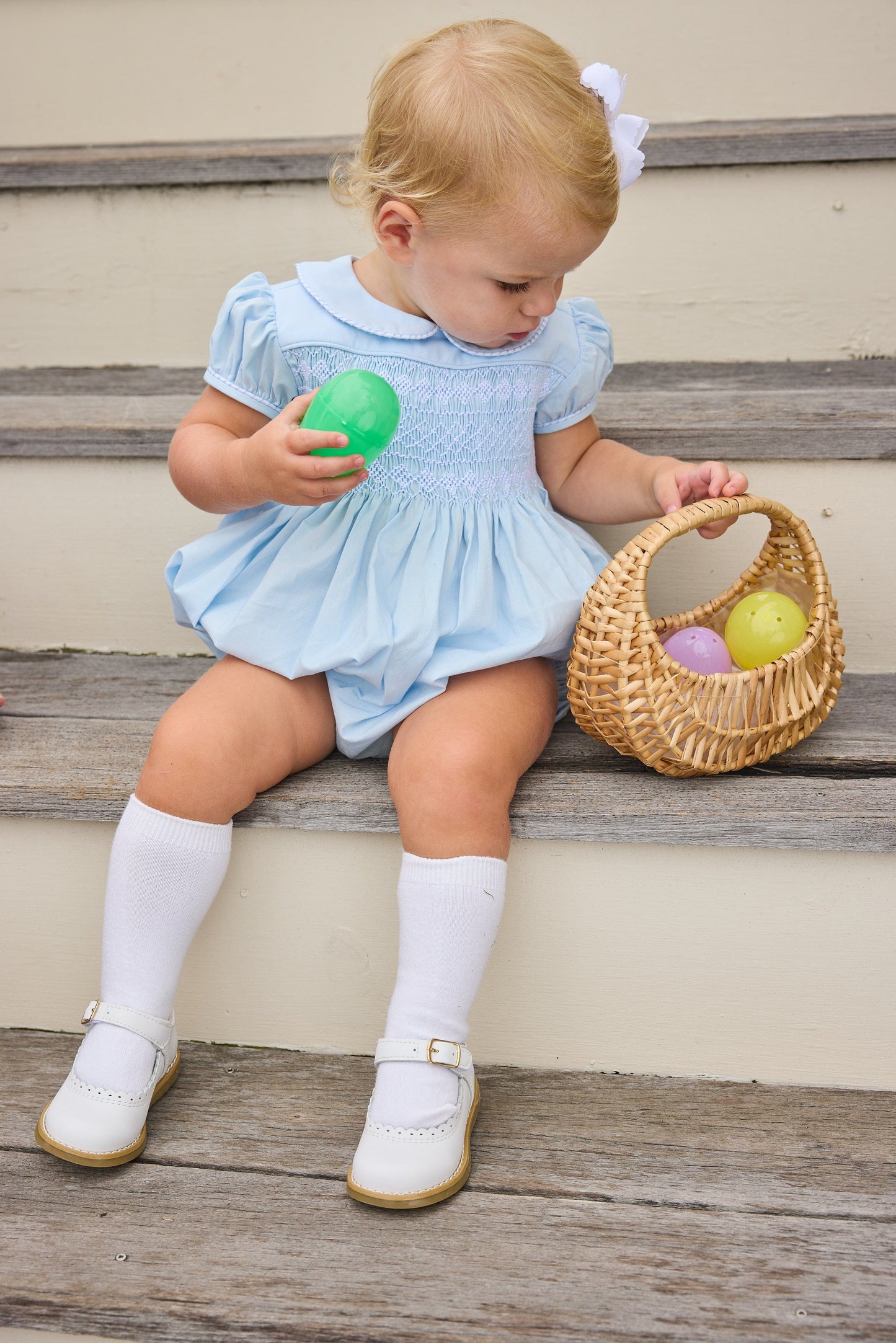 Little English classic smocked emery bubble in light blue with white detailing, smocking around chest, tieable in back, for little girl 