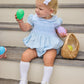 Little English classic smocked emery bubble in light blue with white detailing, smocking around chest, tieable in back, for little girl 