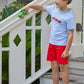 Little english classic t-shirt in light blue and white stripe with toy car applique on chest, Basic short in red twill, for little boy 