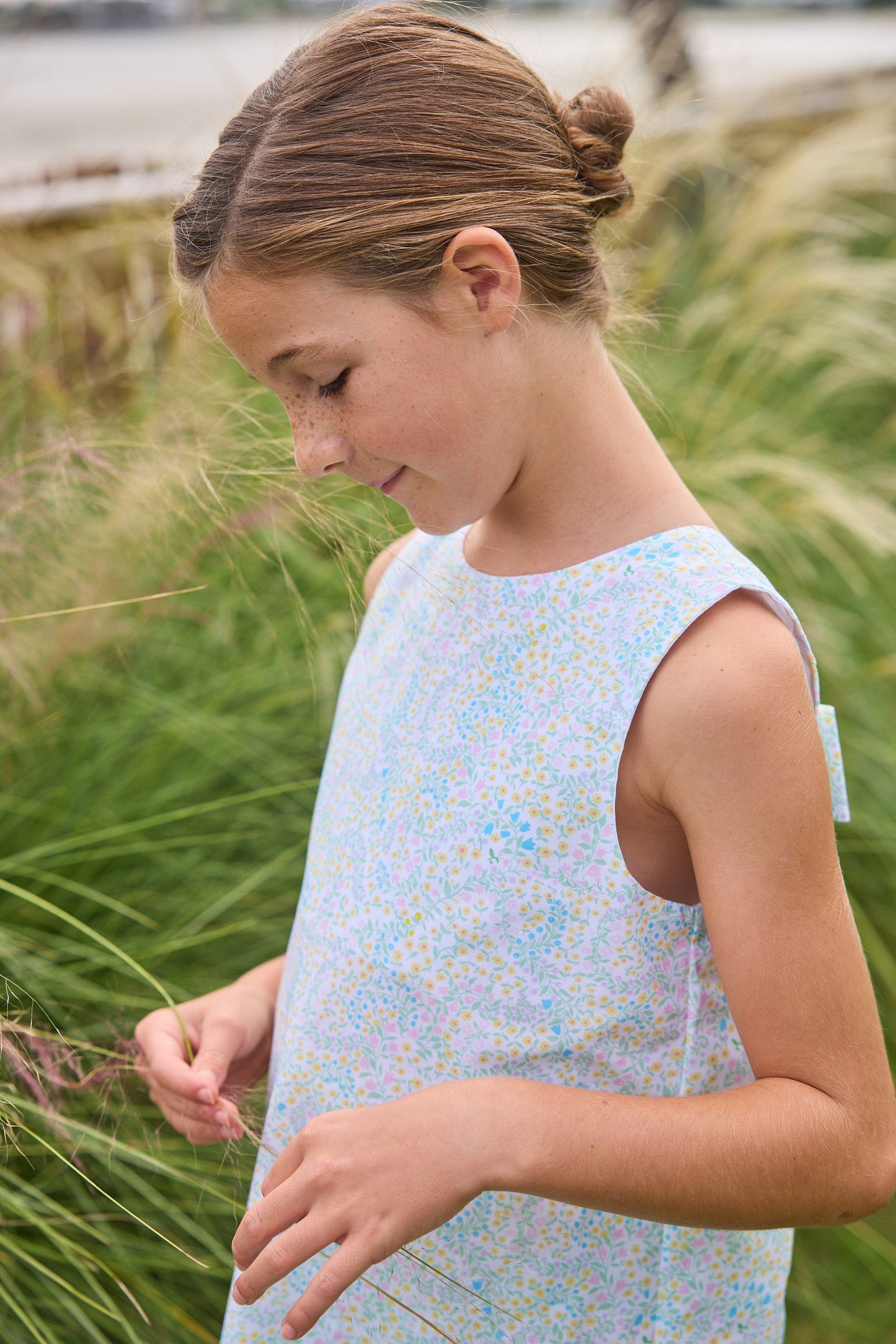 Little English traditional children's clothing.  Aqua, green, and yellow floral sleeveless dress for girls