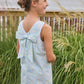 Little English traditional children's clothing.  Aqua, green, and yellow floral sleeveless dress for girls