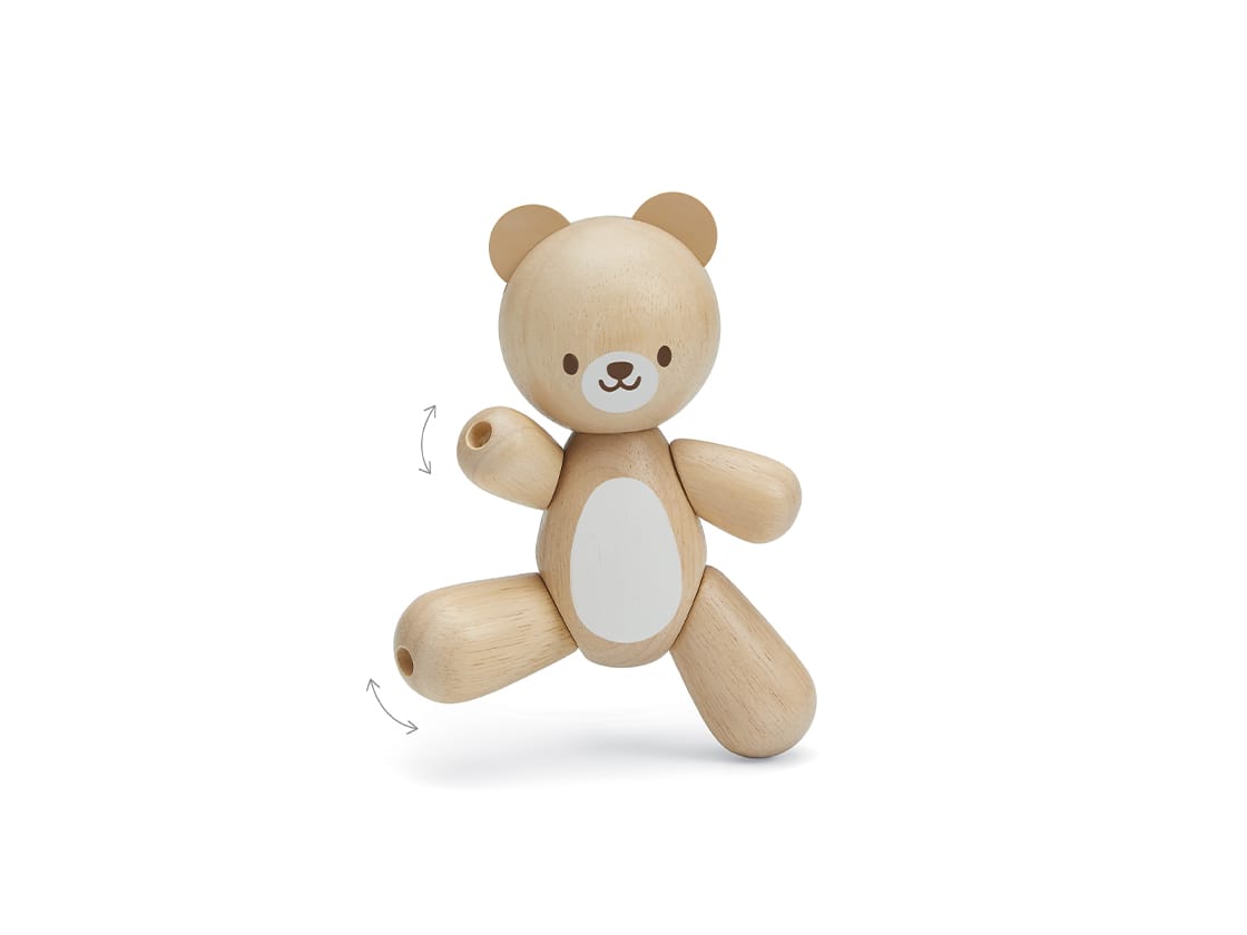 Bear Clutching Toy