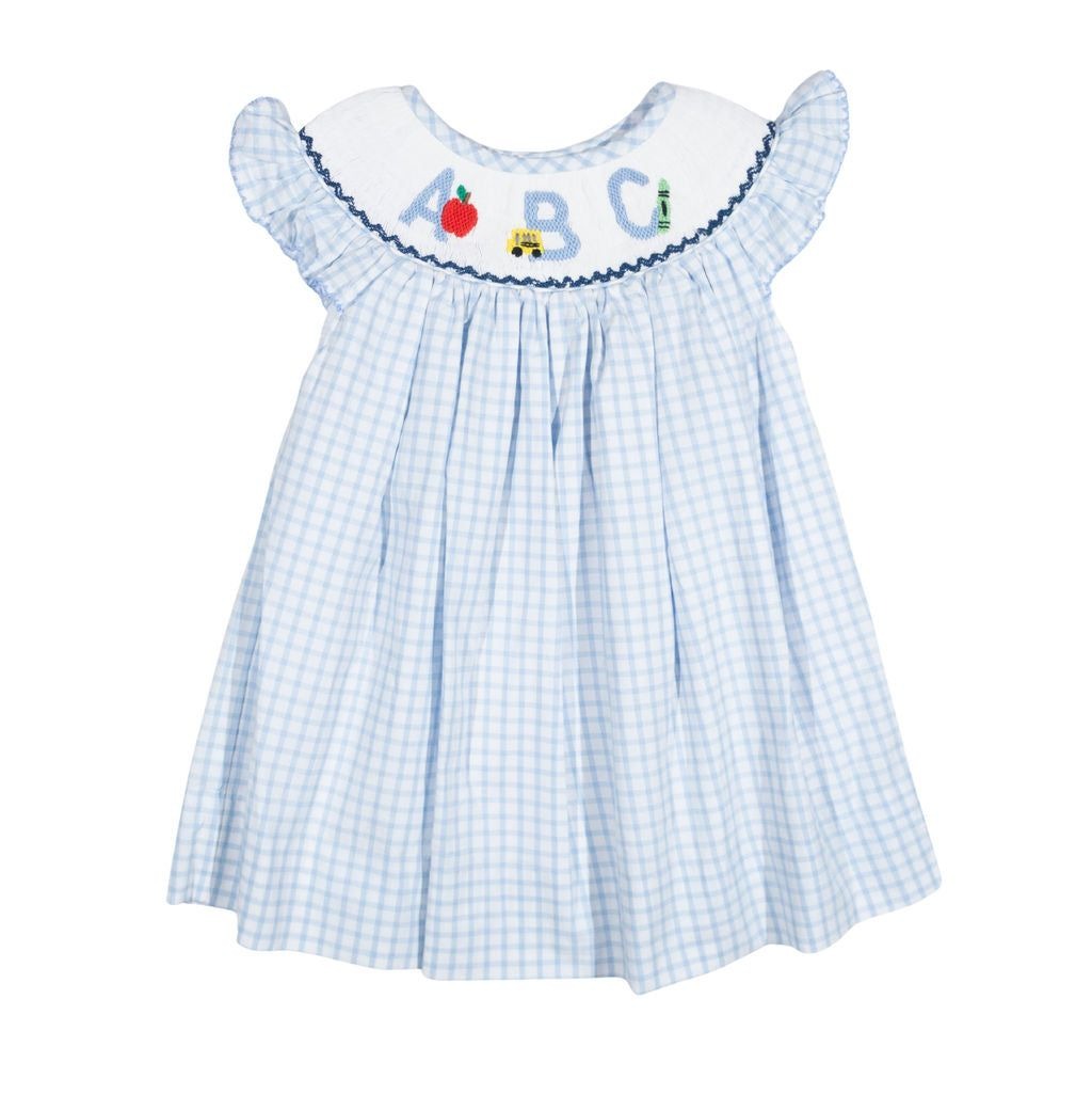 Children's dress with ABC embroidery on a white background