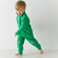 Toddler running in the green Tow Truck Scout Quarter Zip and matching Adventure Joggers