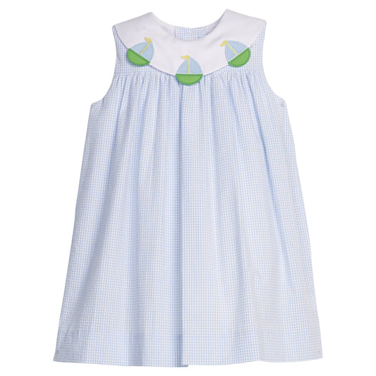 Little English traditional children's clothing.  Light blue seersucker gingham dress with white bib collar and applique sailboats for little girls.