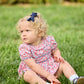 Little English traditional children's clothing.  Soft blue and Nantucket red Lennox Floral short sleeve bubble for baby girls with ruffle collar and blue piping detail at sleeves and chest