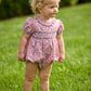 Little English traditional children's clothing.  Soft blue and Nantucket red Lennox Floral short sleeve bubble for baby girls with ruffle collar and blue piping detail at sleeves and chest