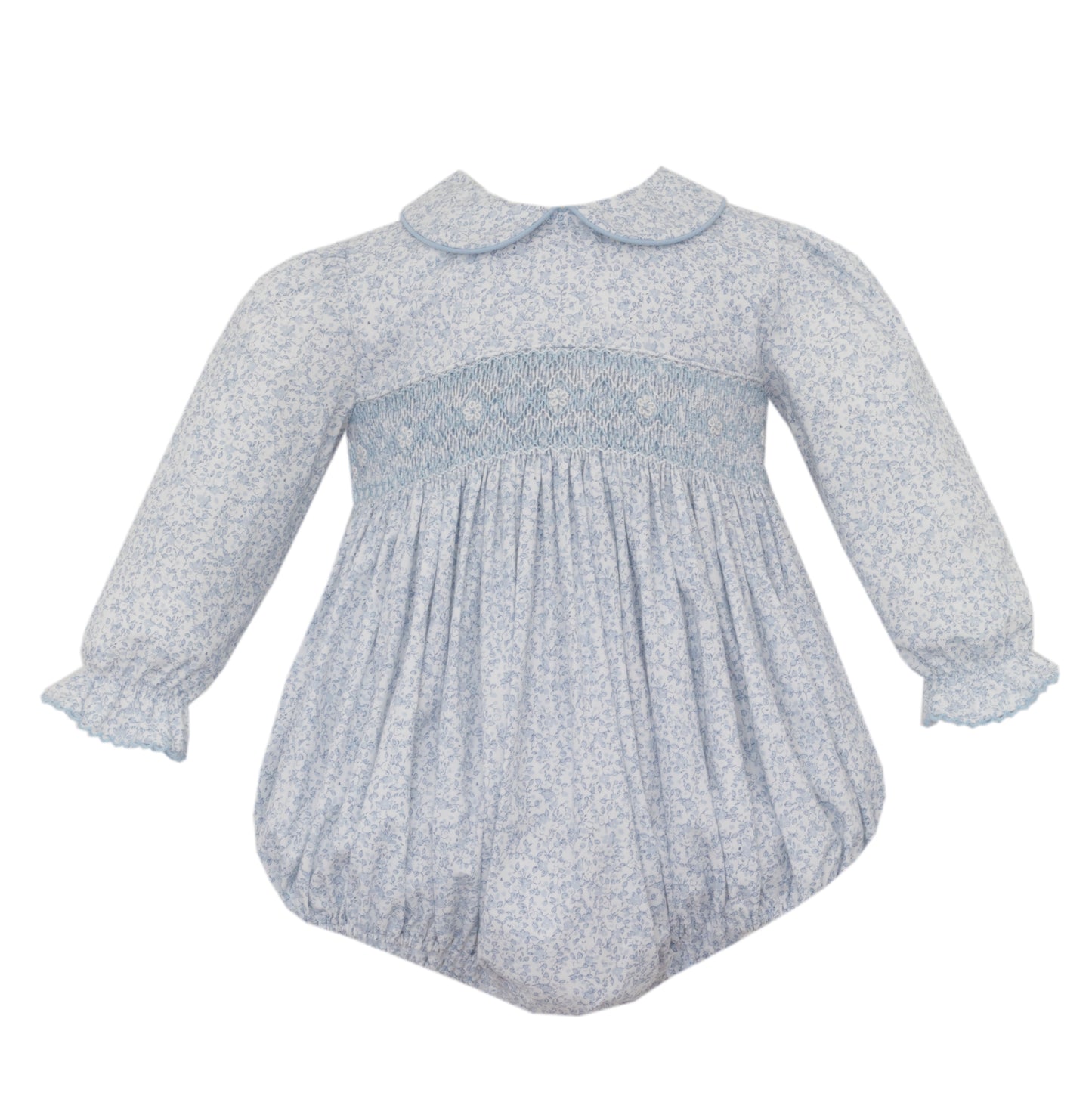 Baby dress with smocked bodice and long sleeves on a white background