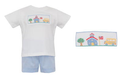 Children's outfit with t-shirt and shorts featuring a school-themed design on a white background