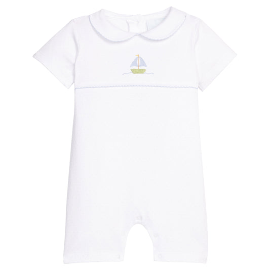 Little English classic ream romper with light blue polka dots and a crochet sailboat motif on chest, for baby boy 