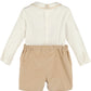 Baby outfit with white long-sleeve top and beige shorts on a white background