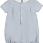 Blue checkered baby romper with white collar on a white background