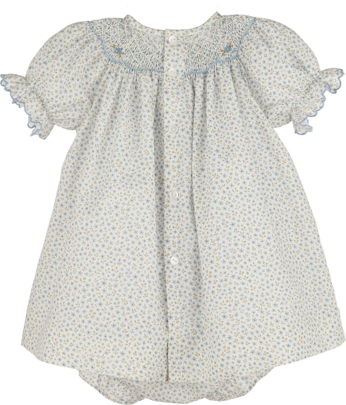 Floral dress with smocked neckline on a white background