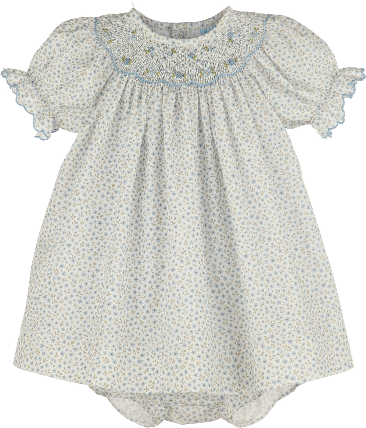 Baby dress with floral pattern on a white background
