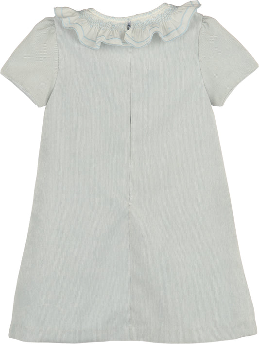Light blue dress with ruffled collar on a white background