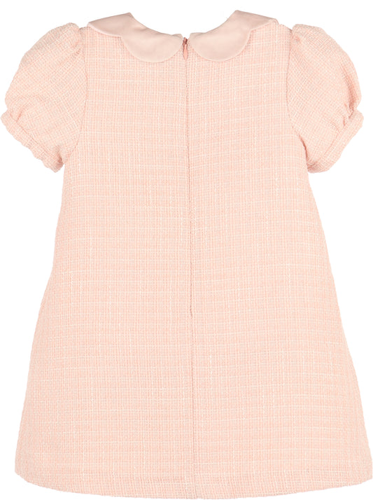 Pink checkered dress with short sleeves on a white background