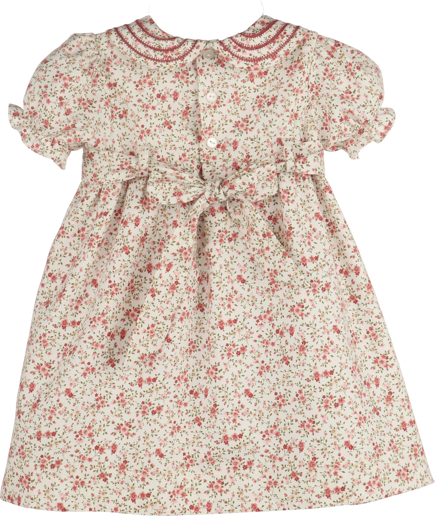 Floral dress with red and pink flowers on a white background