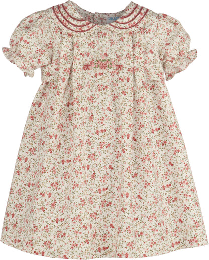Floral dress with red flowers on a white background