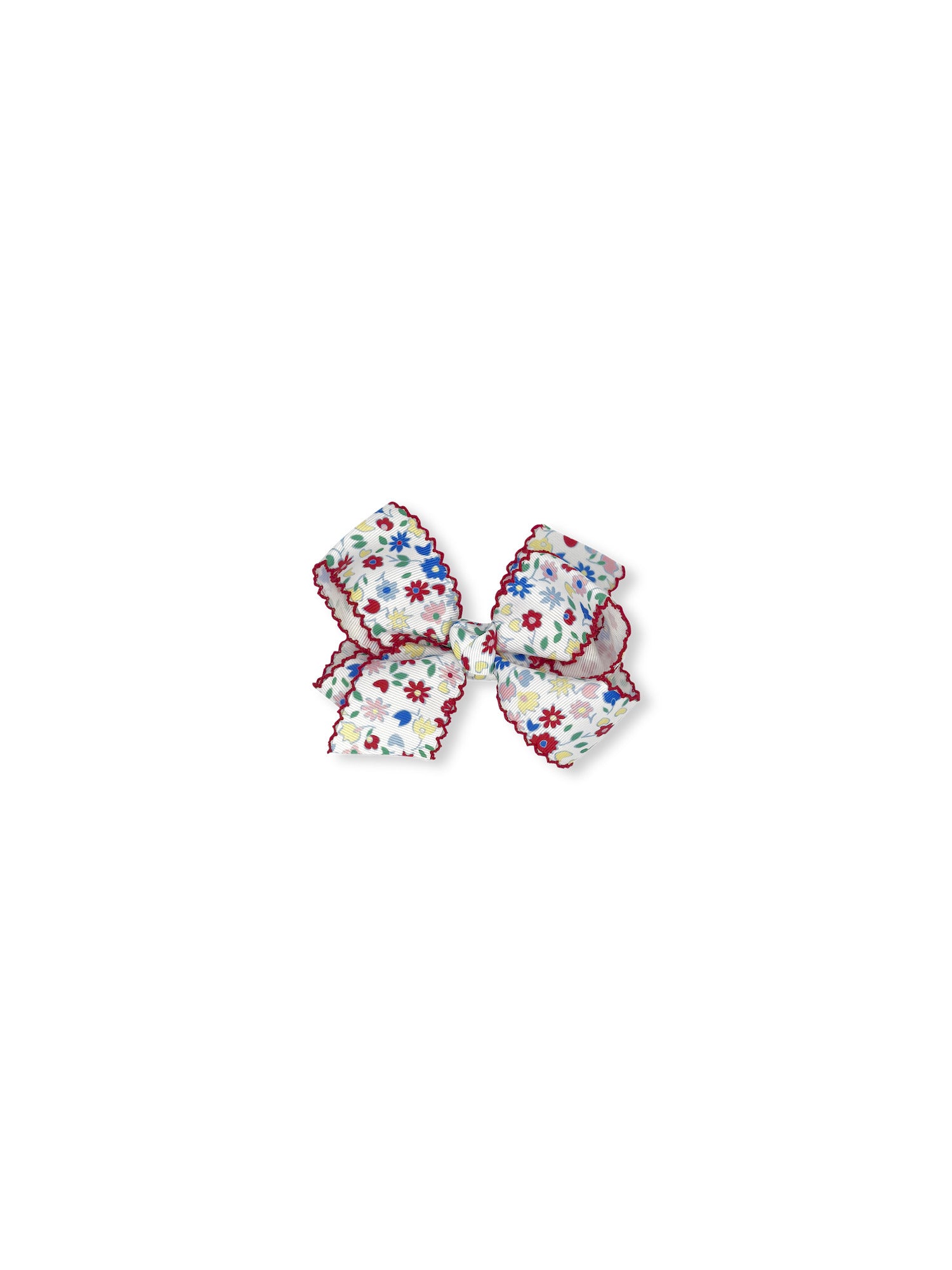 Floral-patterned hair bow on a white background