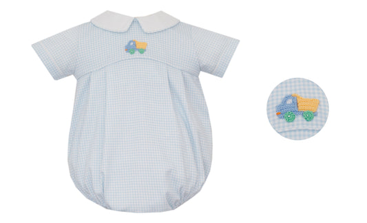 Baby romper with blue checkered pattern and embroidered toy on a white background