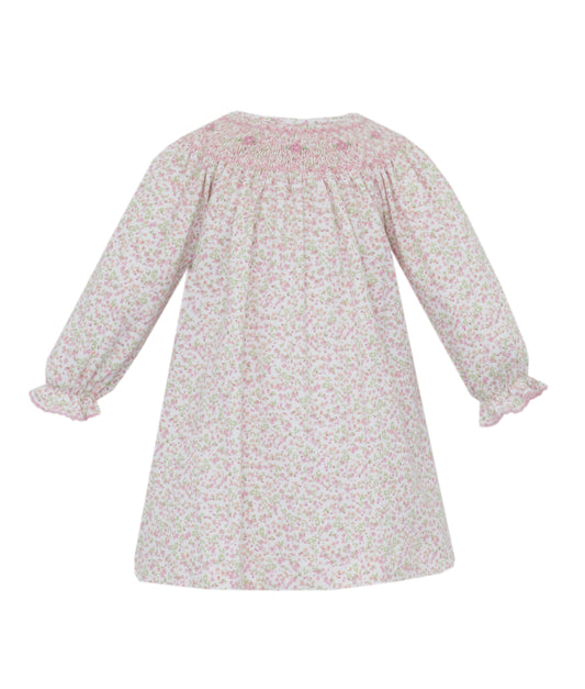Floral patterned dress on a white background