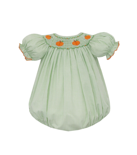 Green checkered baby dress with orange accents on a white background
