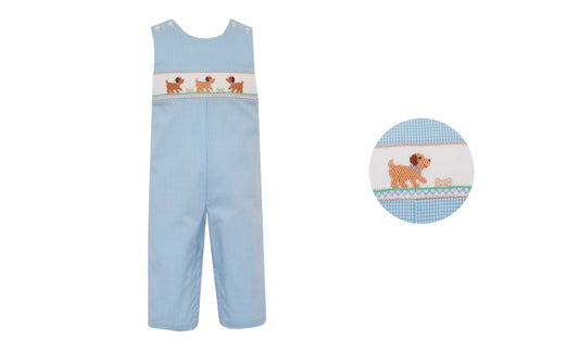 Light blue children's romper with dog design on a white background