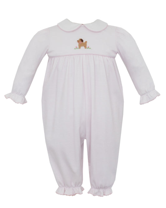 White baby romper with embroidered design on a white background
