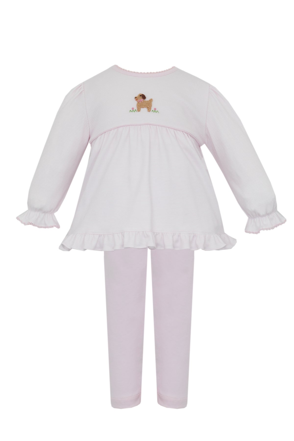 White dress with ruffled skirt and pink leggings on a white background