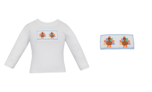 White long-sleeve shirt with embroidered design on a white background