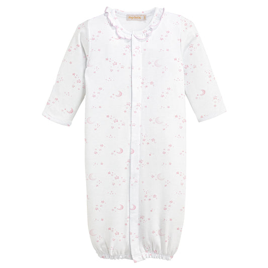White baby gown with pink floral pattern on a white background