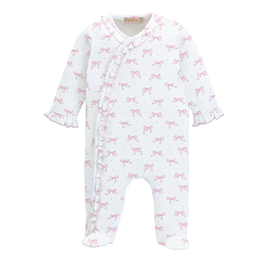 Baby onesie with pink bow pattern on a white background