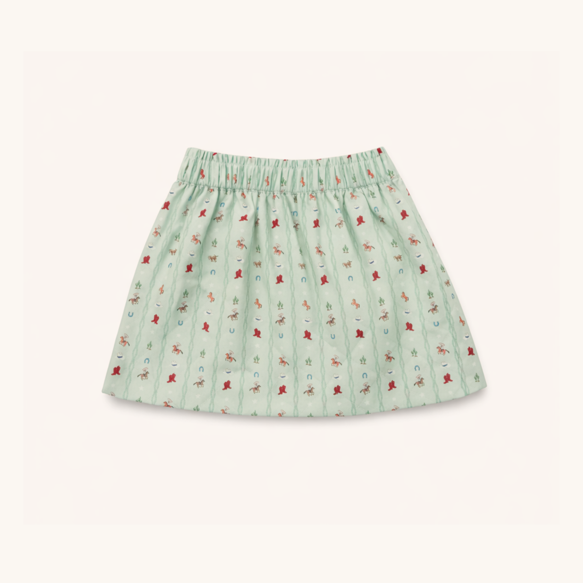 Green skirt with small red pattern on a white background