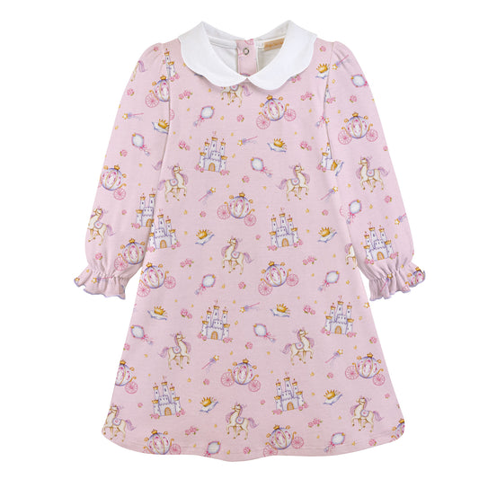 Pink children's dress with fairy tale pattern on a white background