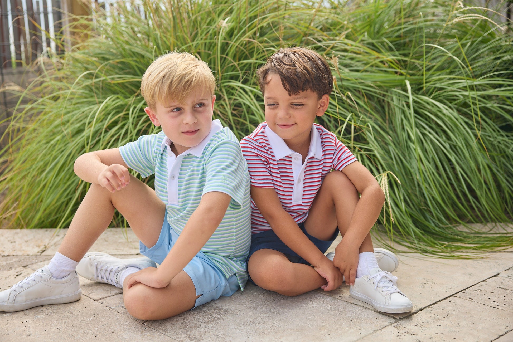 Little English classic short sleeve polo in blue, green, and white greenview stripe and red, white, and blue americana stripe. Sport short in light blue and navy. For little boy 