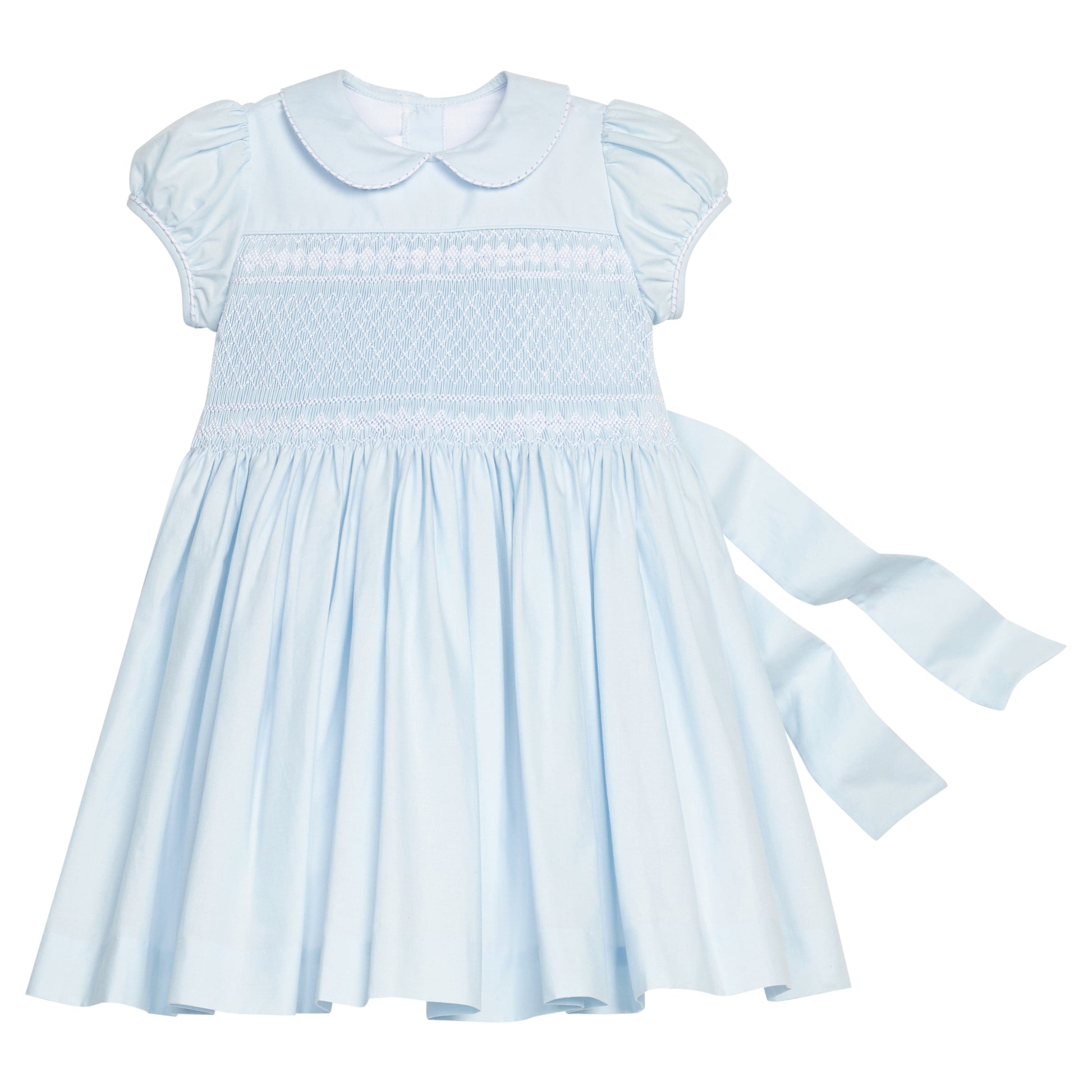 Little English classic smocked emery dress in light blue with white detailing, smocking around chest, tieable in back, for little girl 