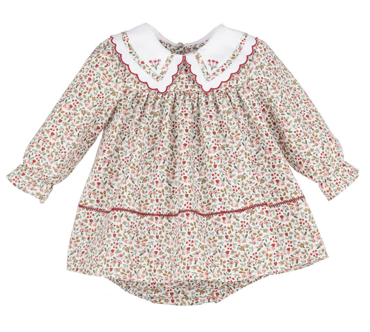 Floral dress with a white collar on a white background