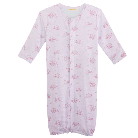 Floral-patterned baby gown on a white background